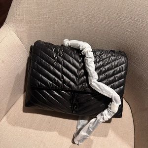 Gorgeous, soft, edgy black nylon crossbody bag! Straps are leather and chains!!